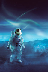 Wall Mural - astronaut walking on an unexplored planet