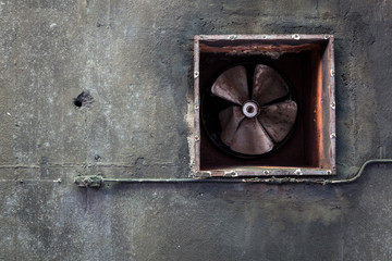 Wall Mural - Abandoned air conditioning duct and rusted fan