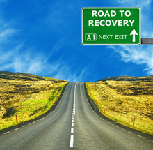 ROAD TO RECOVERY Road Sign Against Clear Blue Sky