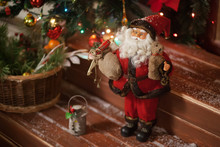 Santa Claus Toyon A Christmas Wooden Porch. Christmas Concept