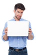 © pikselstock - Young man with blank poster