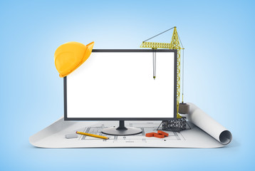 Screen, tower crane, helmet and construction tools on the bluepr