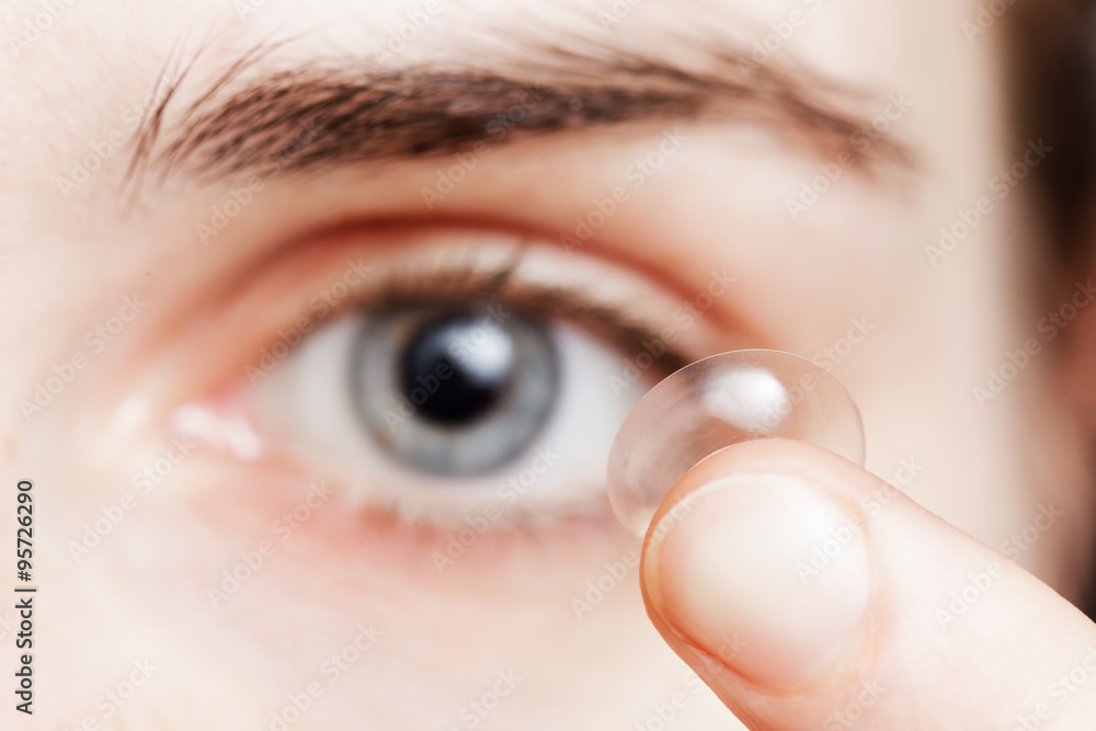 Contact lenses - a convenient way for solving problems with visi - obrazy, fototapety, plakaty 
