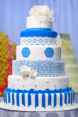 Wall Mural - Big wedding cake decorated with flowers