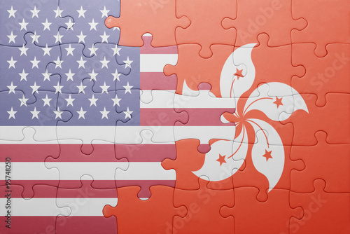 Photo puzzle with the national flag of united states of america and hong kong