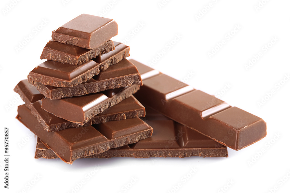 Milk chocolate pieces isolated on white background