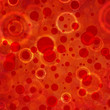 © Attitude1 - orange background with abstract gold circles rings layered with red blurred circles