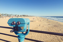 Binoculars At Huntington Beach Pier, California With Vintage Effect