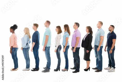 Fotografie, Obraz Side View Of Creative Business People Standing In Row