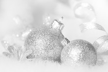 Christmas Silver Baubles In White And Black Abstract Closeup
