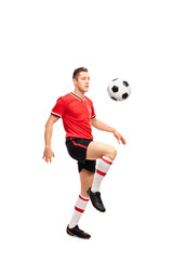 Sticker - Young football player juggling a ball