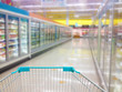 Aisle Milk Yogurt Frozen Food Freezer and Shelves in supermarket