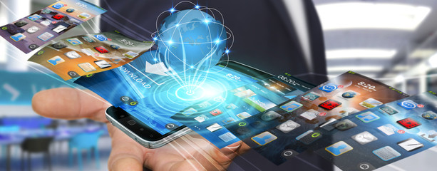 Young man using modern mobile phone
