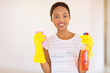 © michaeljung - young african woman cleaning empty house