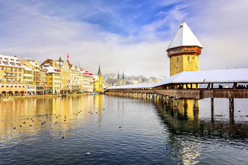 Wall Mural - Lucerne, Switzerland, Chapel bridge and Water Tower on a snowy winter day