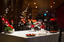 Romantic Dinner Setup, Red Decoration With Candle Light In A Res
