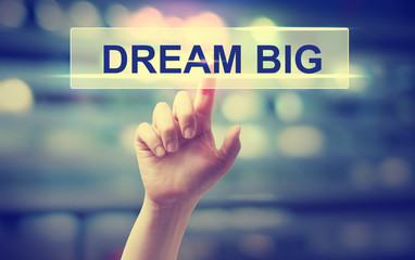 Wall Mural - Dream Big concept with hand pressing a button