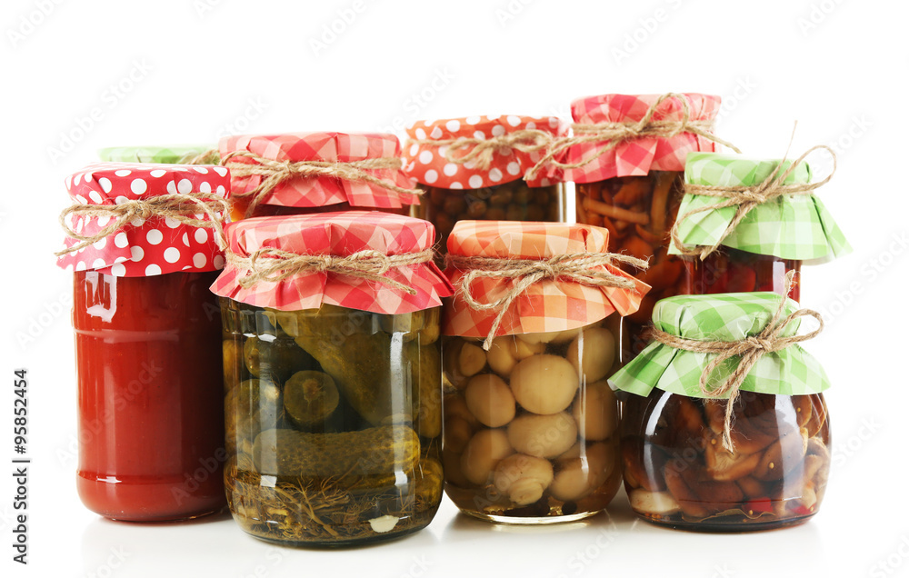Jars  with pickled vegetables isolated on white