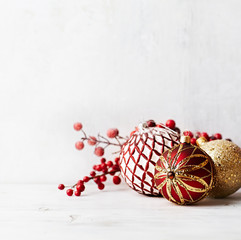 Vintage Christmas balls on a white painted wood