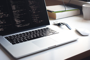js code on laptop screen, web development