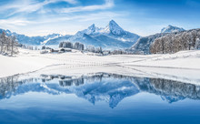 Winter Wonderland In The Alps Reflecting In Crystal Clear Mountain Lake