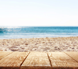 Poster - Wooden planks on beach background