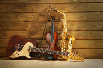 Sticker - Musical instruments on wooden background