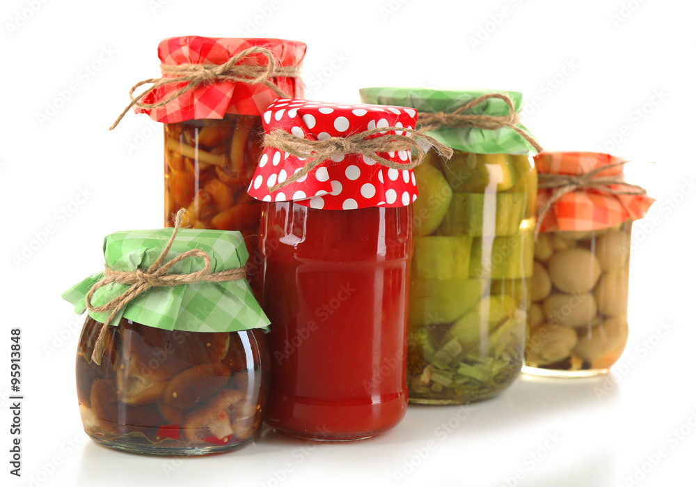 Jars  with pickled vegetables isolated on white