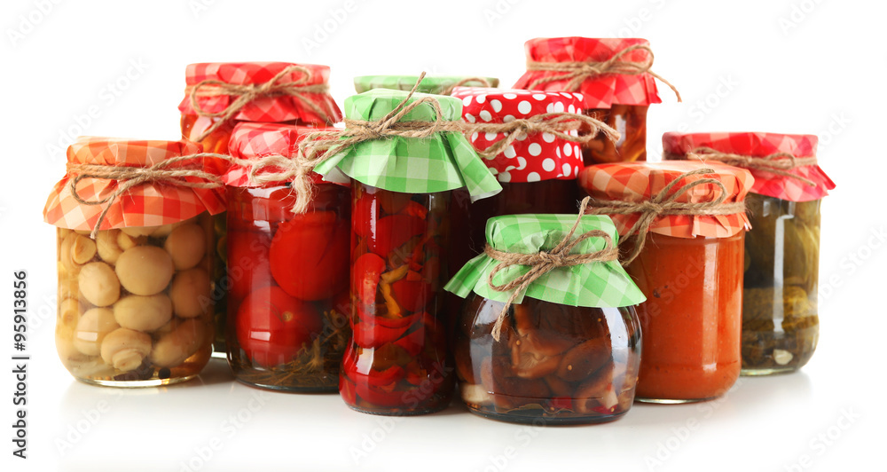 Jars  with pickled vegetables isolated on white