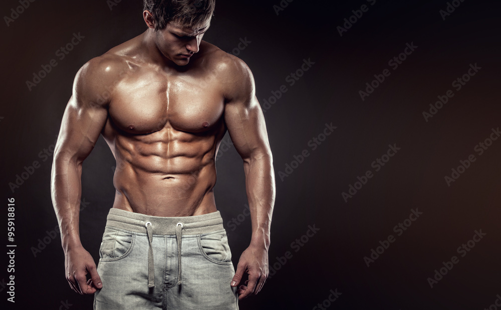 Strong Athletic Man Fitness Model Torso showing six pack abs., c - obrazy, fototapety, plakaty 