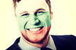 © Piotr Marcinski - Happy man with Bulgaria flag on face.