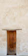 Wooden Door against White Washed Plaster Wall  / A vertical panorama perspective of an old mission wooden door against a white washed plaster wall