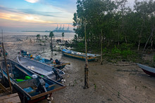 Fishing Boats On Mud At Low Tide