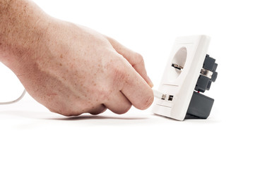 plug in. a man stabs a usb plug into a usb port