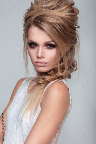 Naklejka ścienna Beautiful women. Makeup and hairstyle.