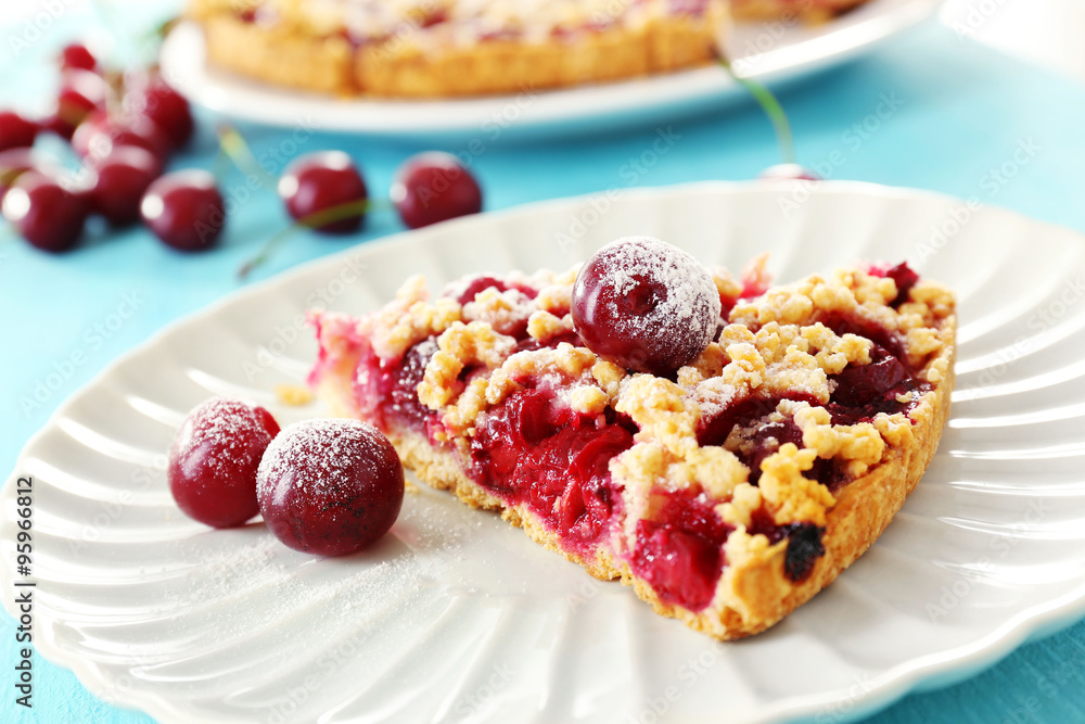 Tasty homemade pie with cherries on table close up