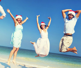 Canvas Print - Two Couple Celebrating Beach Christmas Summer Concept