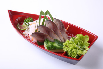 Saba (Mackerel) Sashimi in red boat bowl isolated on white backg