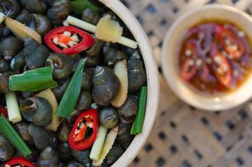 Poster - Snails is boiled by steam with ginger, chilli and citronella. Ab