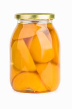 Glass Jar With Preserved Peach Fruits