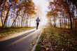 © baranq - Picture of man in hood running in park during sunset