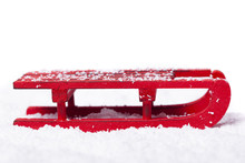Red Sled With Snow Isolated On White Background
