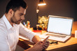 © gstockstudio - Staying in touch even late hours.