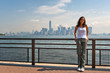 © XtravaganT - Woman Posing in front of New York City Skyline