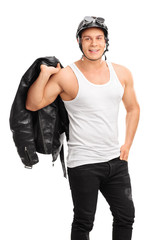 Sticker - Muscular biker holding a leather jacket