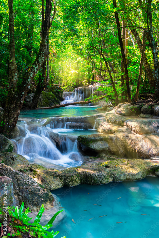 Beautiful waterfall in Thailand tropical forest - obrazy, fototapety, plakaty 