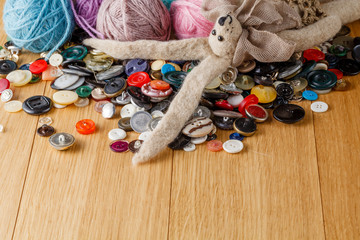 Heap of button on wood table