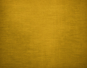 Wall Mural - Canvas grunge background texture in elegant golden colour