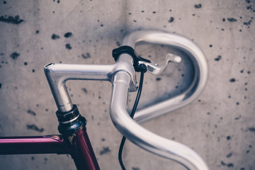 City road bicycle handlebar closeup, vintage style