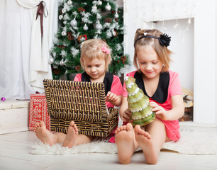 gifts for little girls at  New Year tree